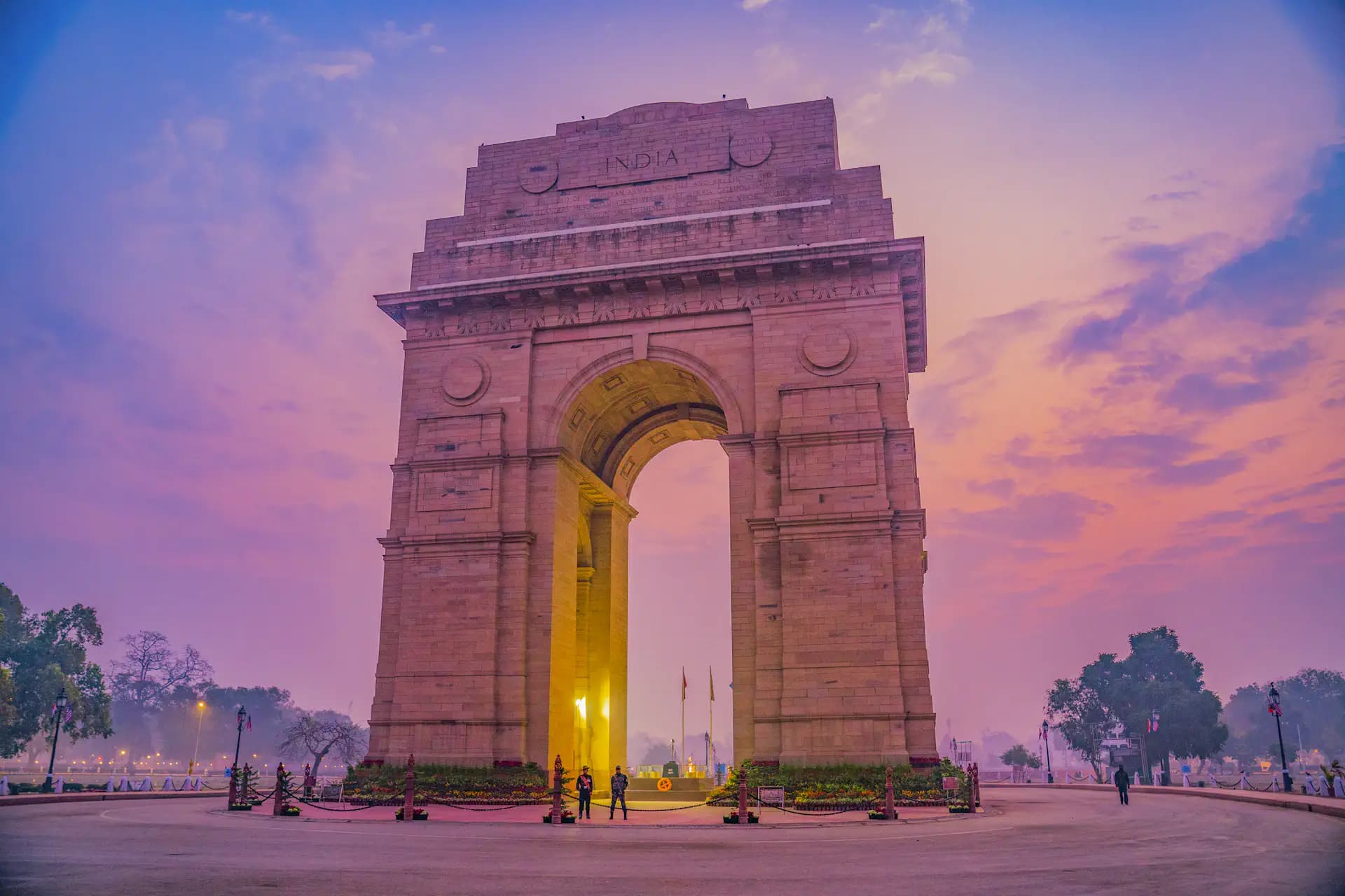India Gate illuminated at dusk in New Delhi